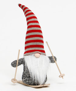 Kris Gnome with Red Stripe Hat on Skiis